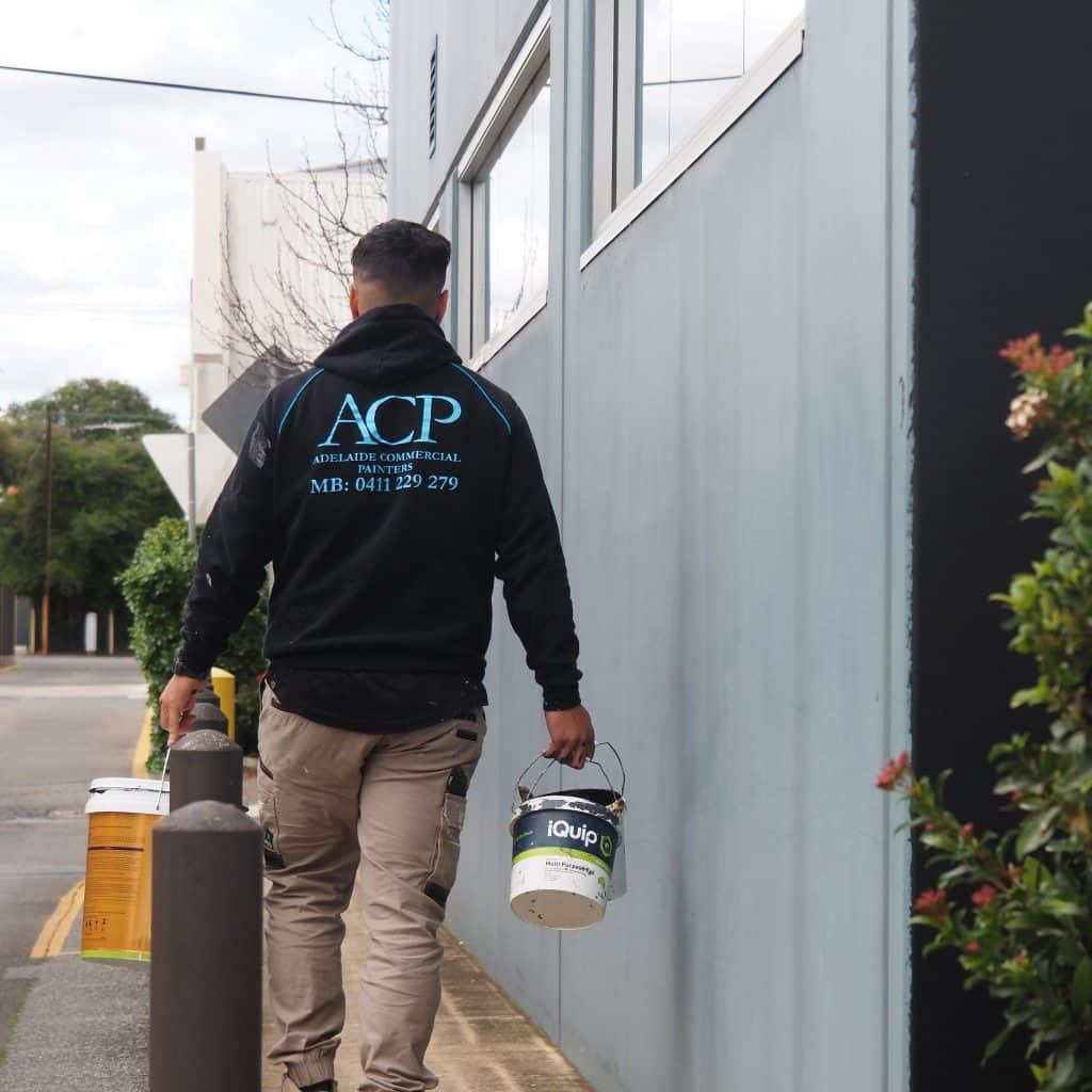 Man Walking Wearing The ACP Hodie